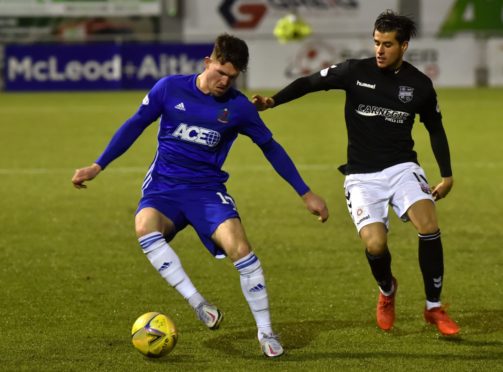 Cove Rangers midfielder Jamie Masson in action against Montrose's Lewis Milne.