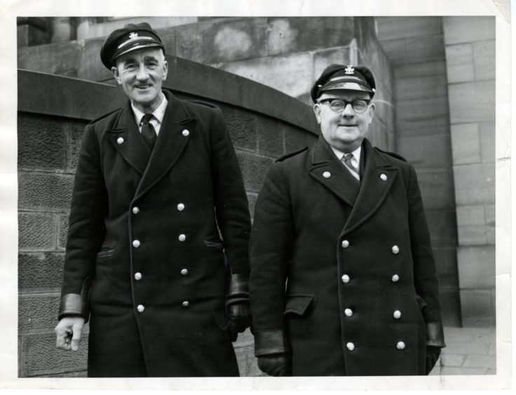 two of the corporation's drivers can be seen looking cheerful in their incredibly smart uniforms in March 1962