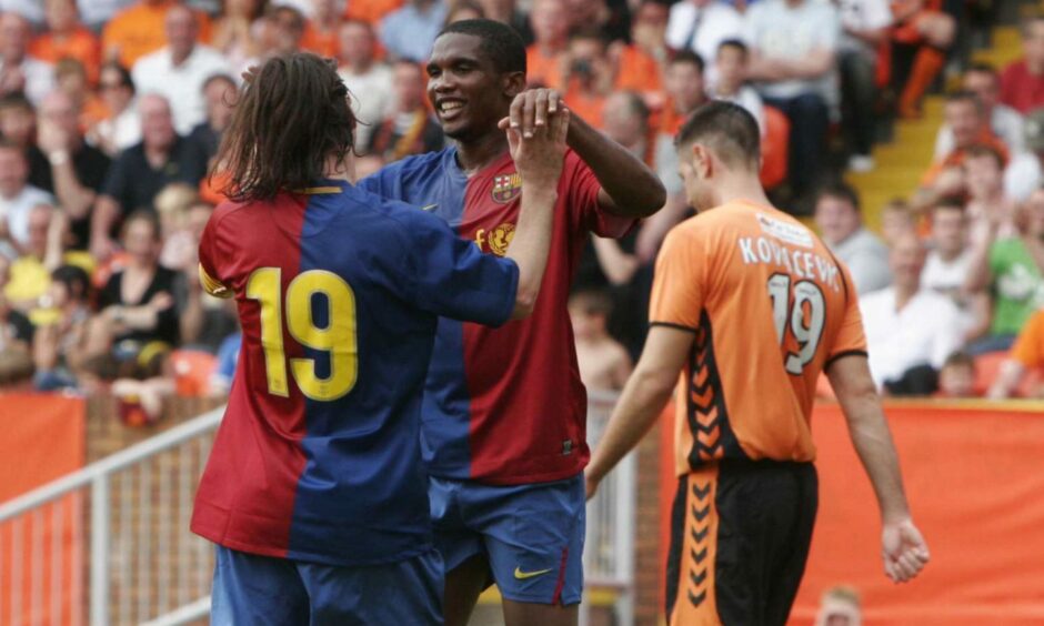 Samuel Eto'o and Messi celebrate another goal for the Catalan side.