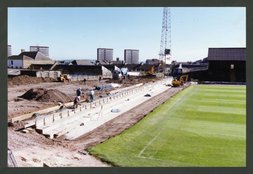 Construction on one of the new stands is under way in May 1999.