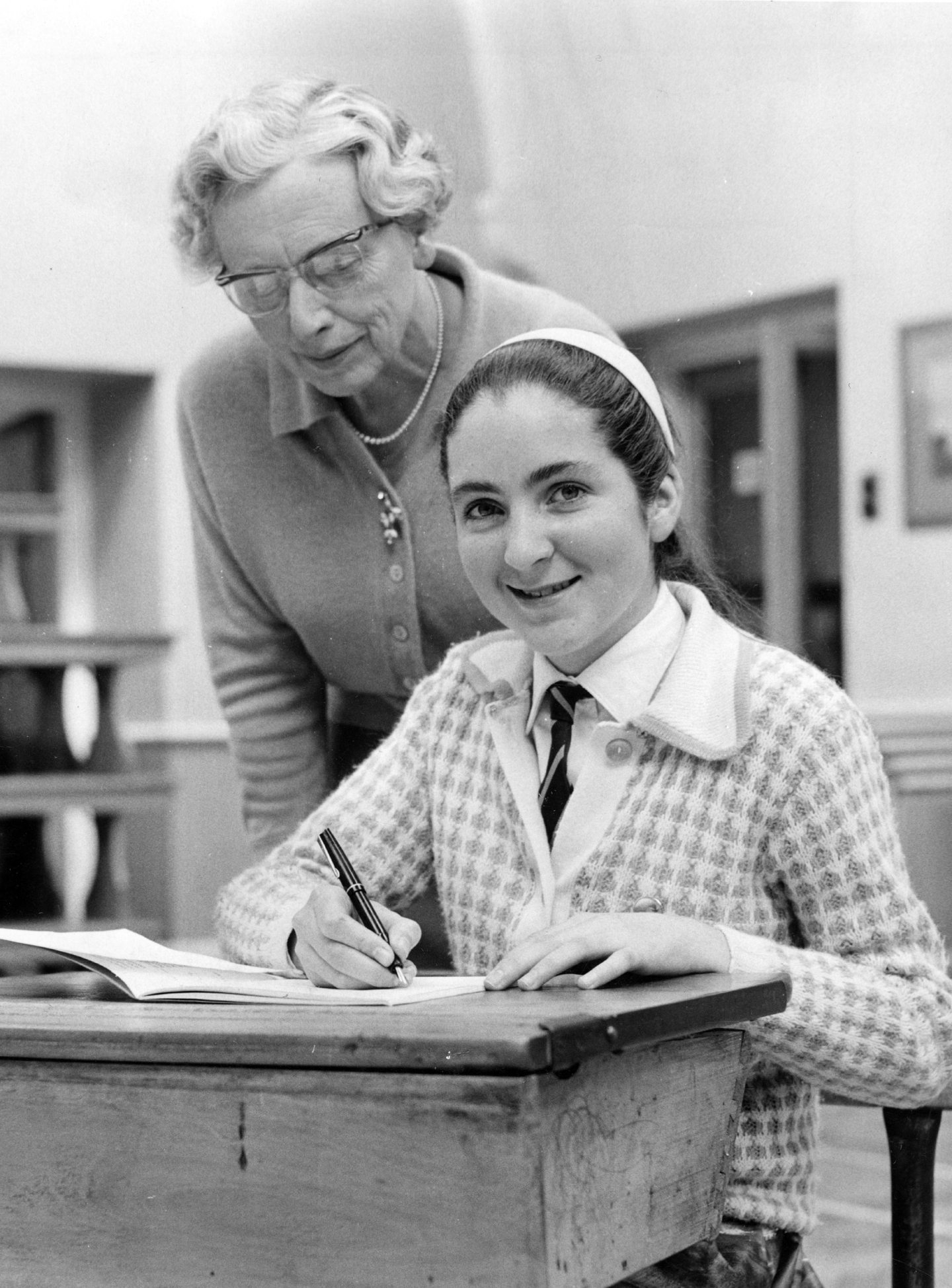 Miss Harriet Maclennan with pupil Fiona Rhind, who won a £4 book token in the Brooke Bond handwriting competition in 1967. Aberdeen Journals Library.