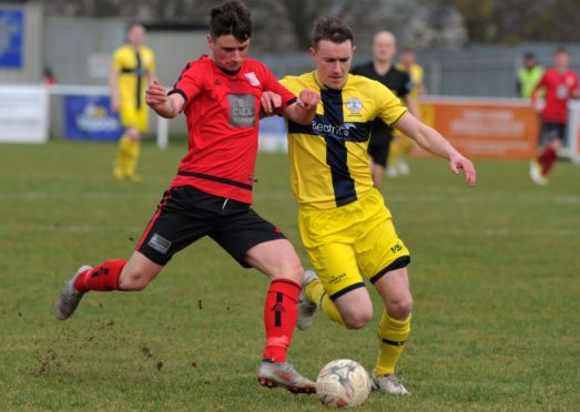 Gary Manson, right, in action for Wick Academy in 2019