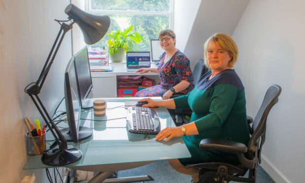 Sarah-Jane Dale and Karen Nichols of the Skills Collective in the office.