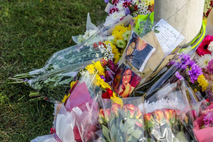 Floral tributes left at the scene of the accident. 