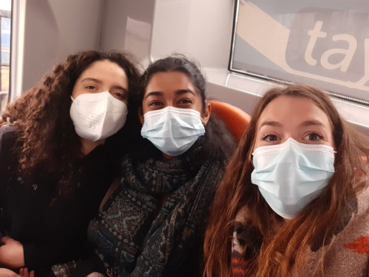 From left, three St Andrews University students Silvia Ventura, Gina Gnanasampanthan and Giulia Benedetta Calabrese who despite having had both vaccination jabs have been refused quarantine exemption.