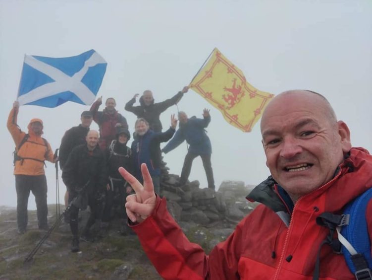Hillwalker Cam bagging his last Munro - 25 years after completing them first time round.