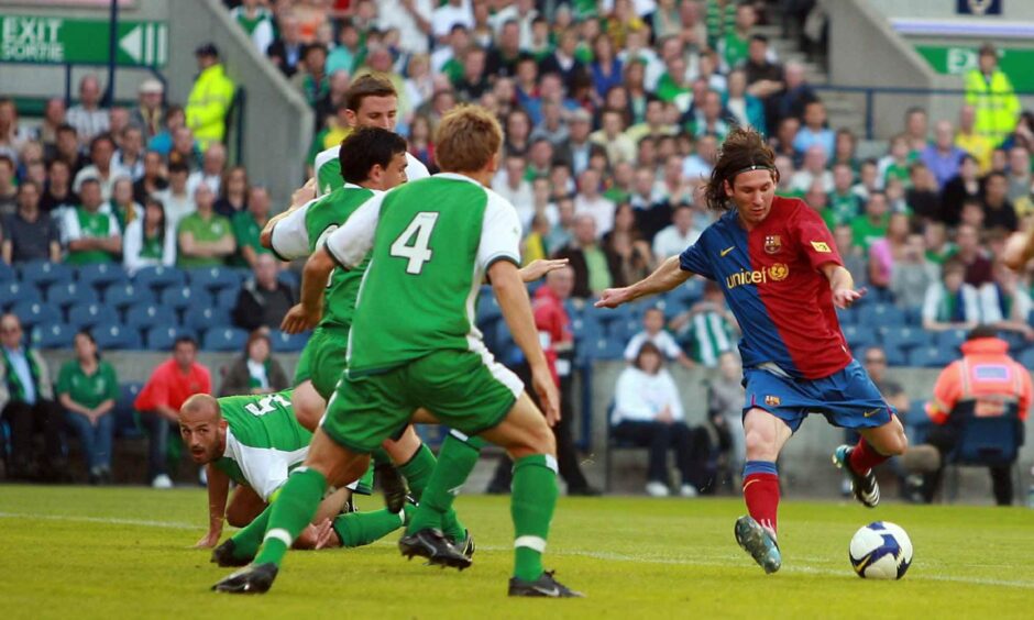 Messi scores his first-half goal against Hibs at Murrayfield.