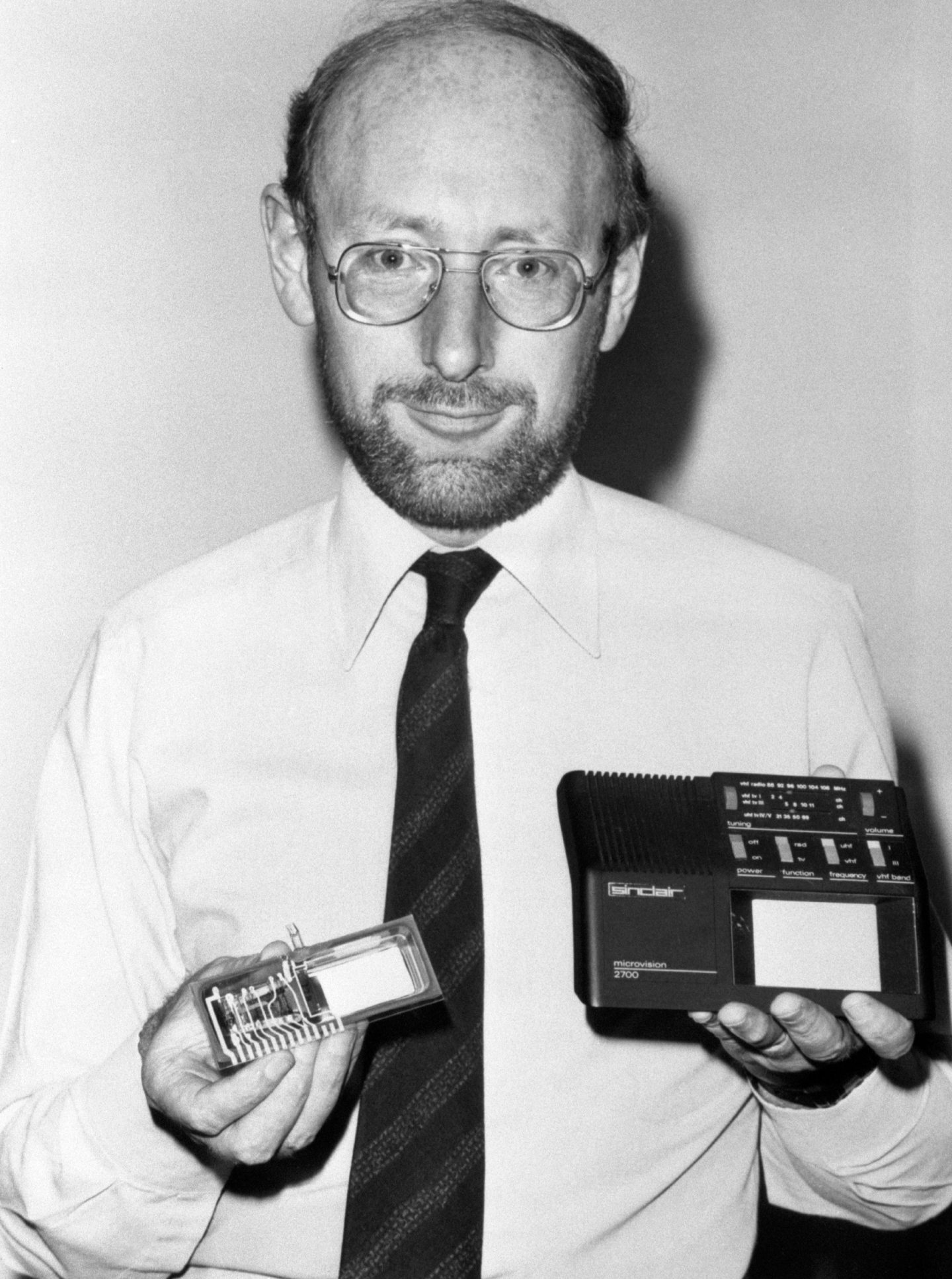 Clive Sinclair with a prototype of his pocket TV being manufactured at Timex in Dundee. Image: PA.