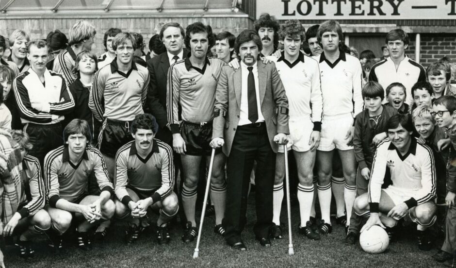 Doug Wilkie and the teams line up before the benefit match in 1981.
