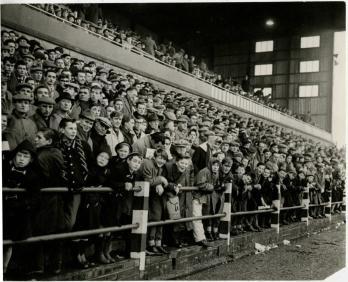 Some of the crowd at East End Park during a match against Rangers in November 1963.