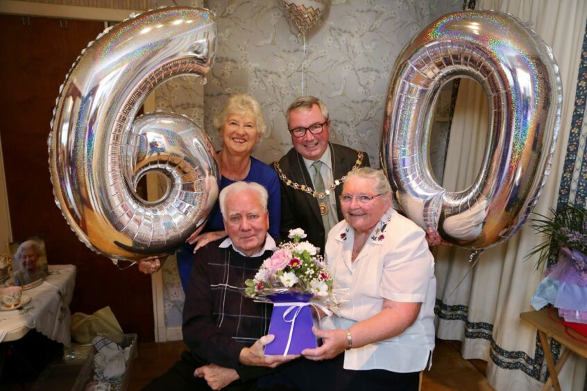 The Smiths were congratulated by Depute Lord Lieutenant Margaret Bett and Depute Provost Craig Fotheringham. Pic: Gareth Jennings/DCT Media.