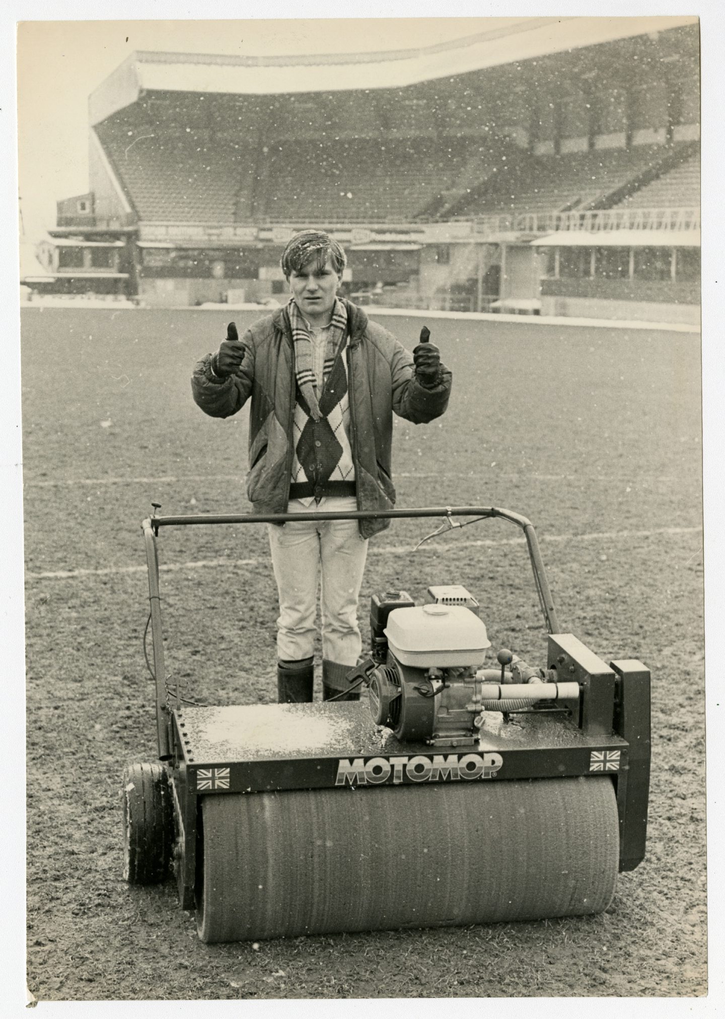 Tannadice groundsman James Fox giving the thumbs up after going over the the pitch with the club's motomop in February 1986.