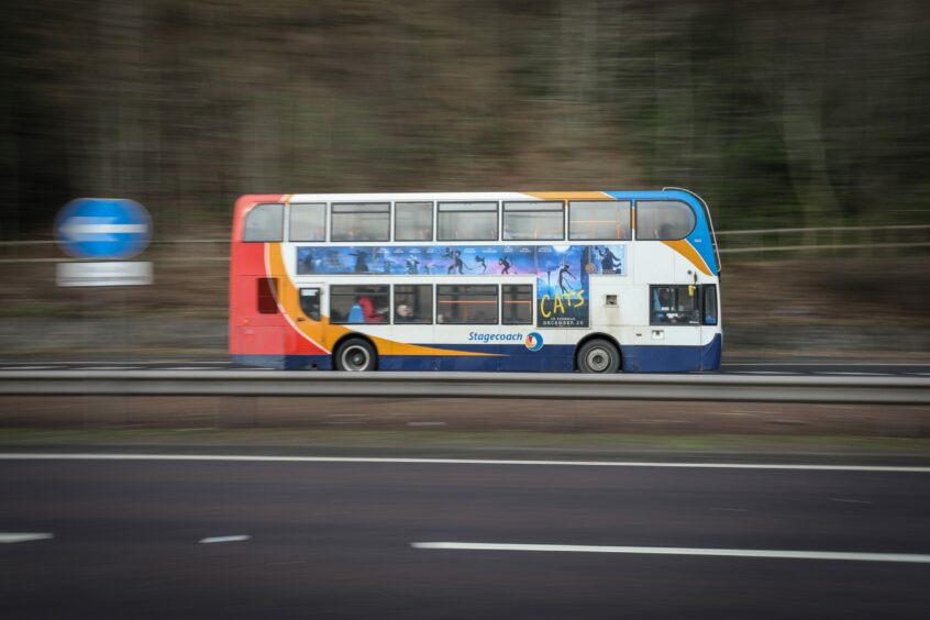 A Stagecoach bus driving down a dual carriageway