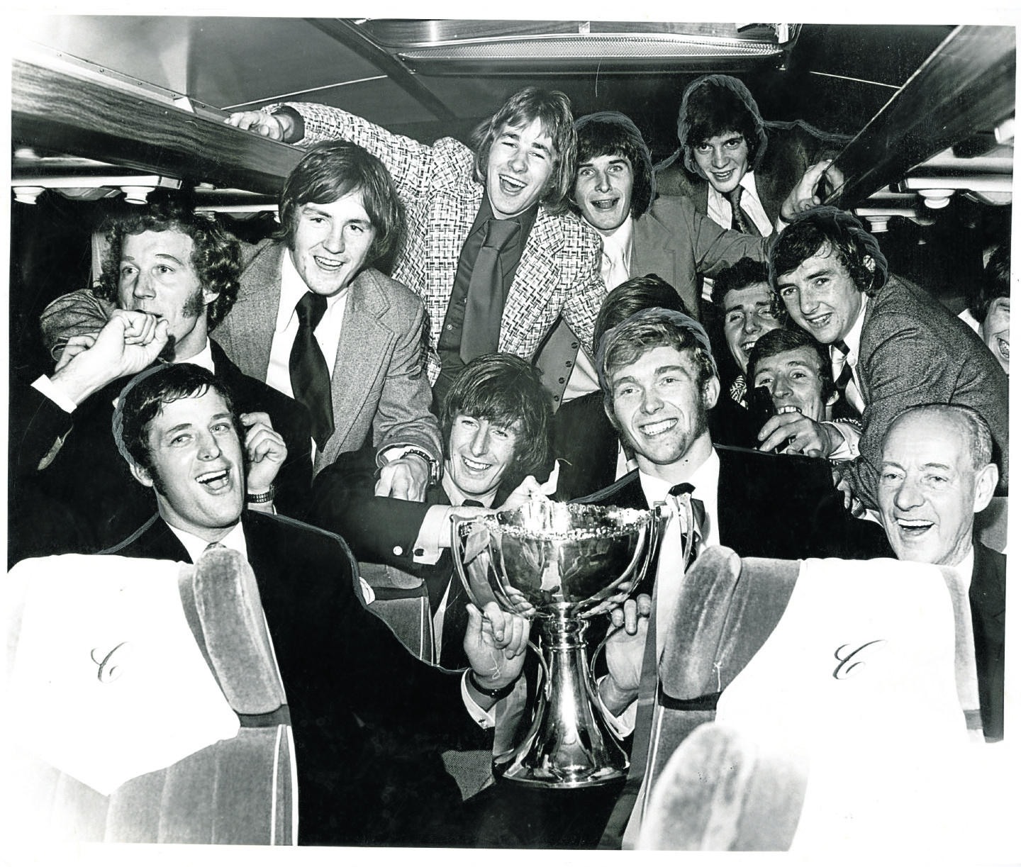 The Partick Thistle players in a happy mood on the bus after their win, with Alan Rough pictured at the back on the left.