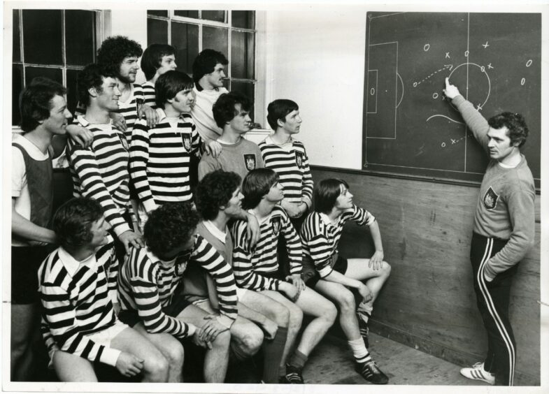 Doug Wilkie and the Queen's Park squad being schooled by manager Joe Gilroy in 1978.