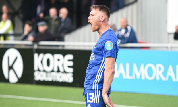 Cove Rangers forward Rory McAllister celebrates opening the scoring.