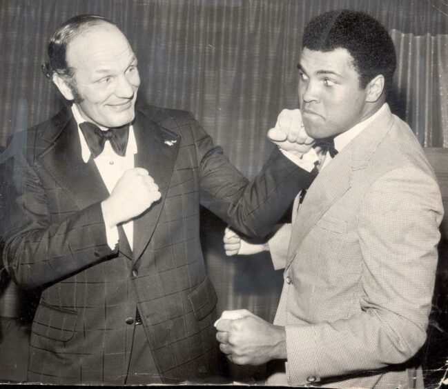 Sir Henry Cooper and Muhammad Ali.