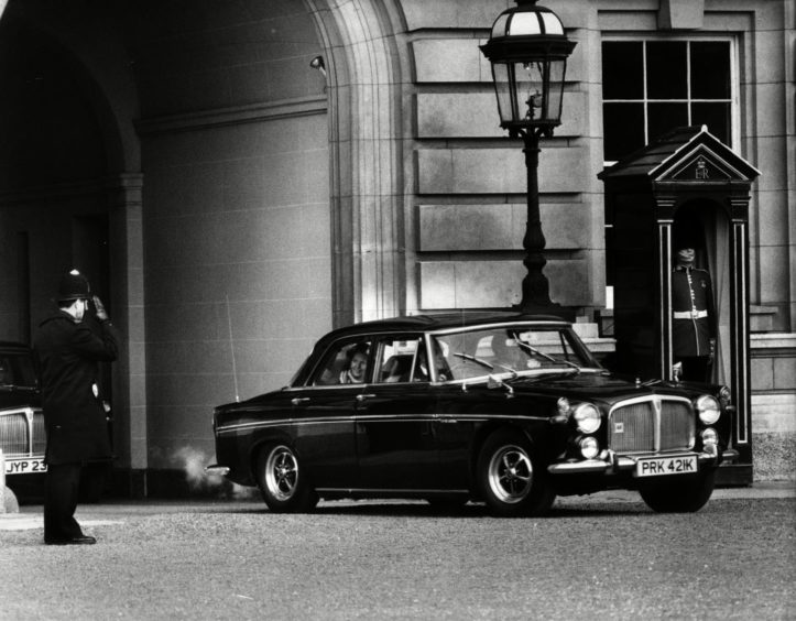 Margaret Thatcher leaves Buckingham Palace in May 1979 in her Rover after becoming Britain's Prime Minister.