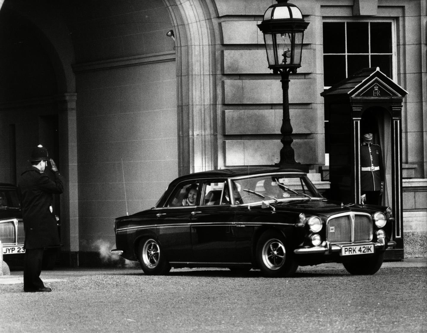 Margaret Thatcher leaves Buckingham Palace in May 1979 in her Rover, after becoming Britain's Prime Minister.