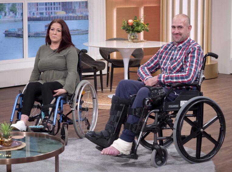Barry Douglas and friend Claire Vickers sitting on their wheelchairs in the This Morning studio
