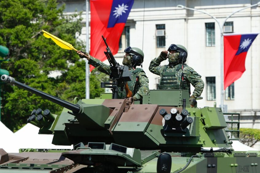 Armoured vehicles on parade in Taipei.