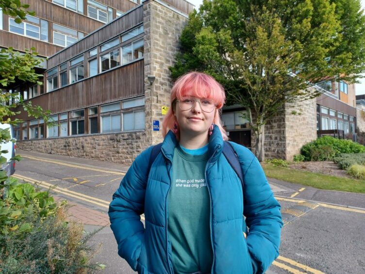Jasmine Bennett, English and philosophy student at Dundee University, standing outside the uni.