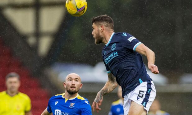 Sweeney clears in front of Chris Kane.