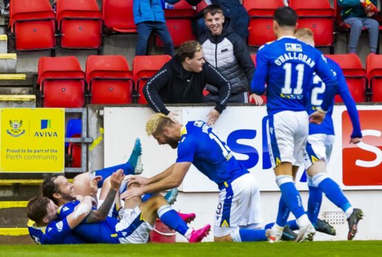 Stevie May celebrates making it 3-0.