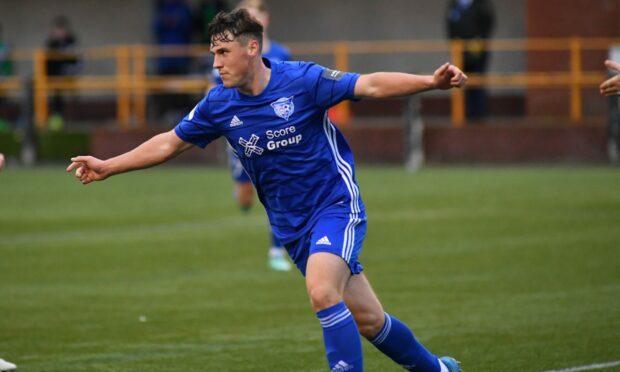 Peterhead defender Josh Mulligan celebrates his goal.