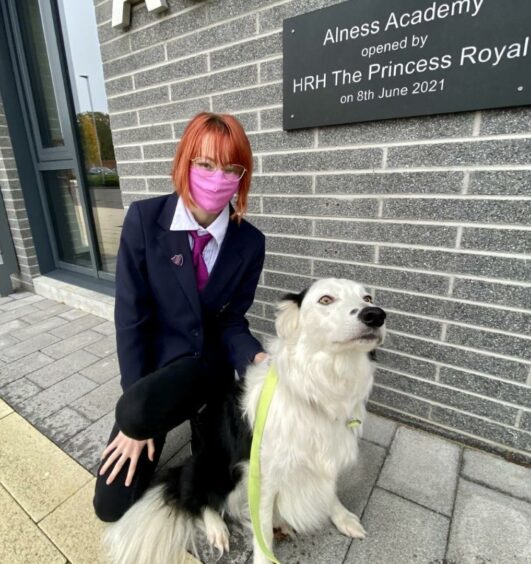 School dog Bru and pupil Dominika Kalbukowska