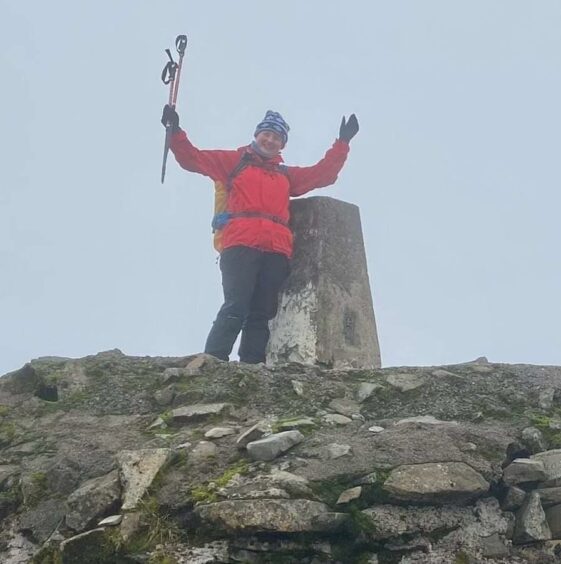 Orkney head teacher Wendy Bowen at the top of Ben Nevis which she climbed to raise money for cancer research
