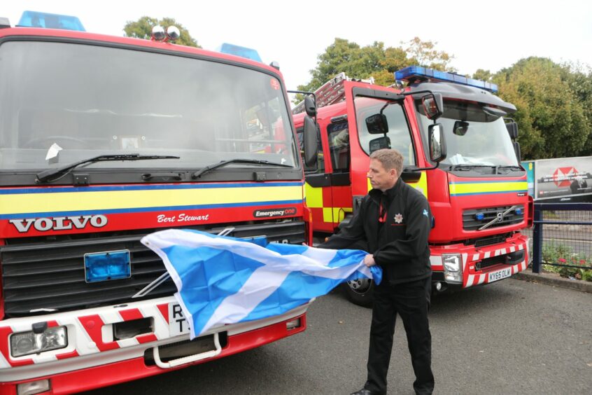 Fife firefighter Mark Bryce unveils Bert's engine