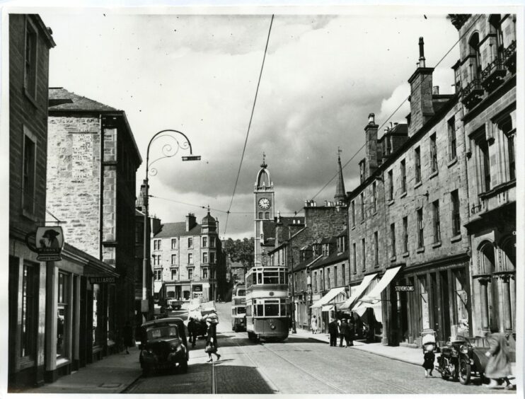 A tram in Lochee High Street 