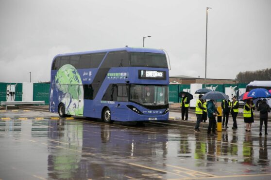 Electric buses in a rainy Glasgow. 