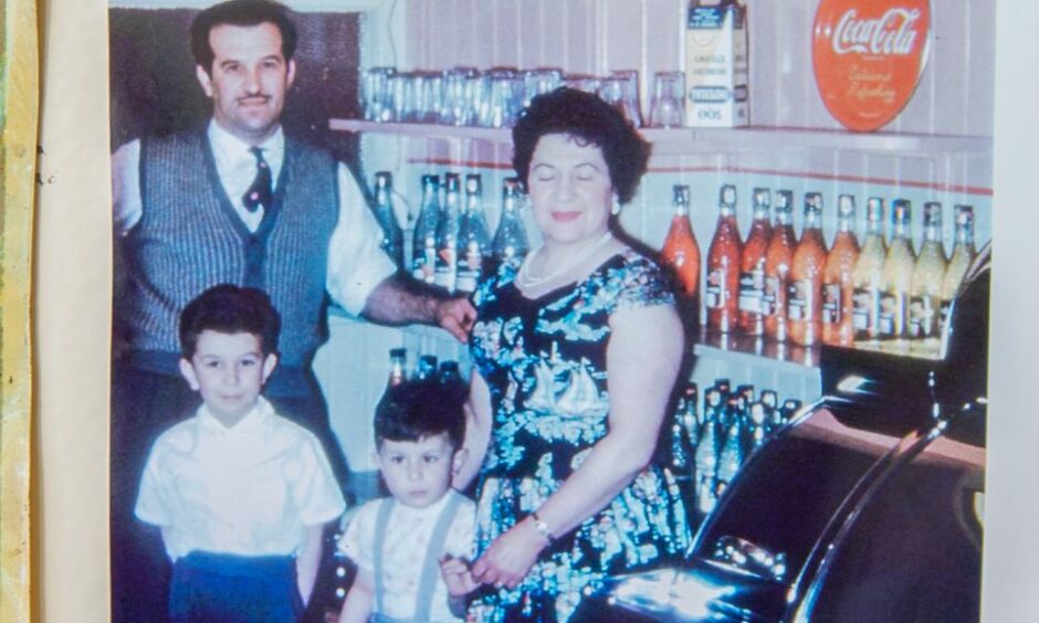 John and Frank pictured with their parents as young boys.