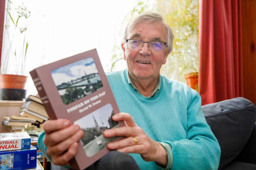 David Potter at home with his book, which charts the life and times of Forfar.