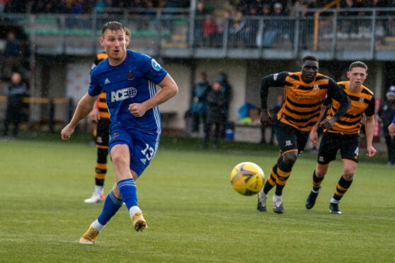 Rory McAllister tucks away the penalty for his hat-trick.