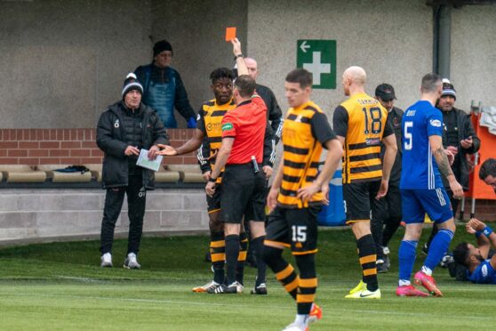 Mouhamed Niang is shown an early red card against Cove Rangers.