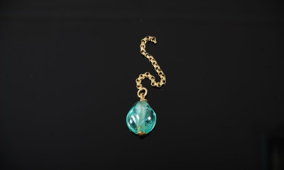 The Emerald bead that sold for thousands of pounds.