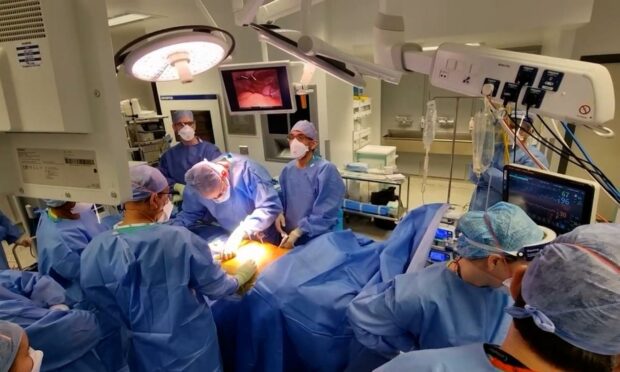 Robotic-assisted surgery is helping NHS Grampian shrink its waiting list and get patients home sooner.