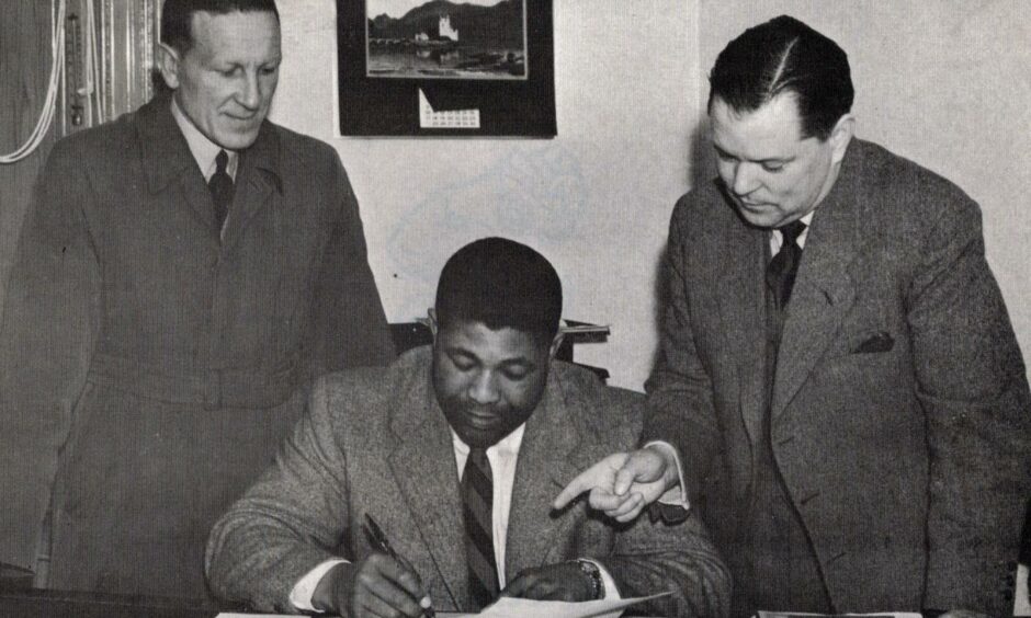 Nigel Hazel signs for Strathmore in 1954.