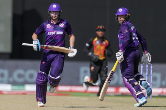 Scotland batters Matthew Cross, left, and Richie Berrington put on a partnership of 88.