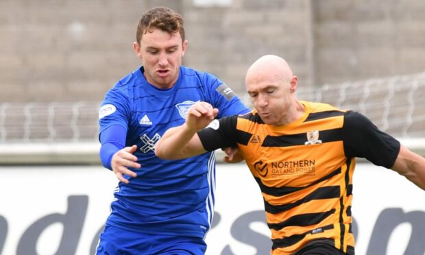 Peterhead defender Andy McDonald, left, in action against Alloa Athletic.