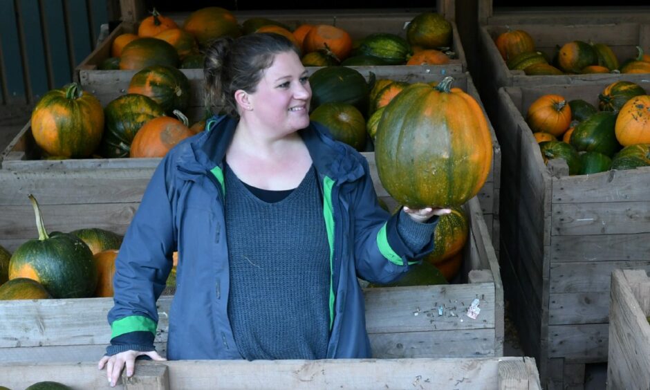 Fiona Smith pictured with some pumpkins.