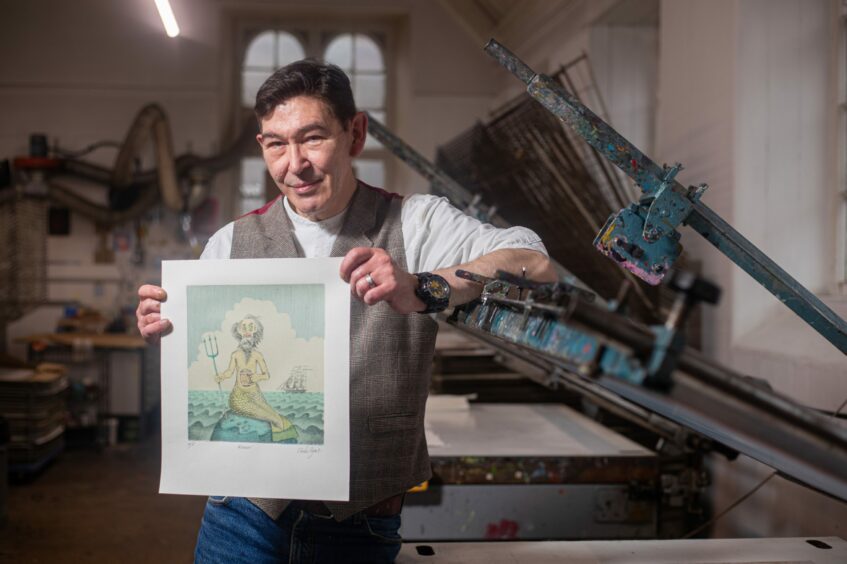 Charlie Hynes with a Merman artwork