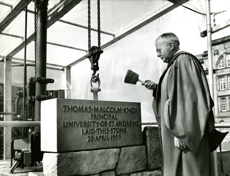 Sir Malcolm laying the foundation stone of the iconic tower.