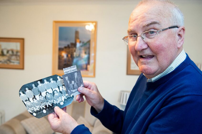 Colin Grant with some memorabilia from his time playing with Peterhead FC.