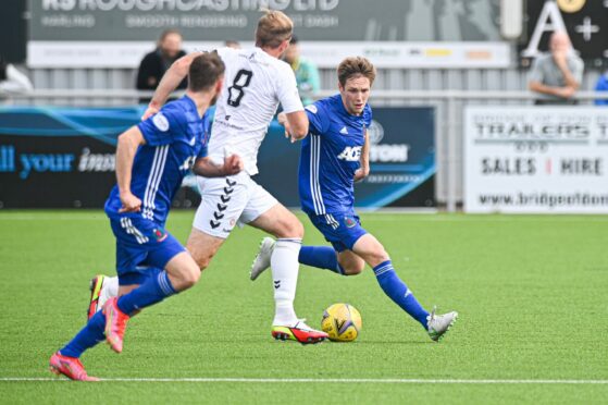 Blair Yule in action for Cove Rangers against Montrose.