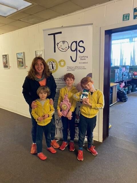 Martel Maxwell and her boys visit Togs' premises in Dundee.