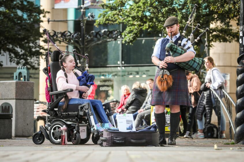 bagpiping teen dundee wheeled piper